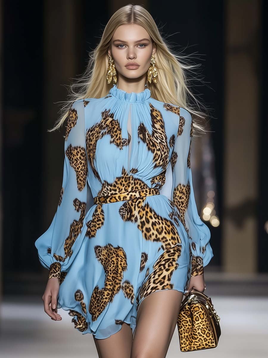 Female wearing a blue leopard print mini dress with puff sleeves against a plain background.