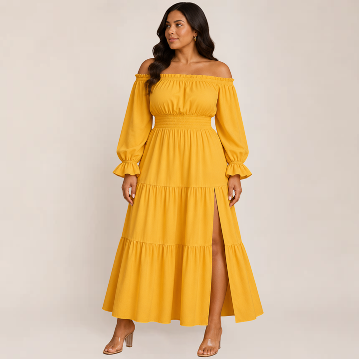 Female wearing a chic off-shoulder outfit on a plain background.