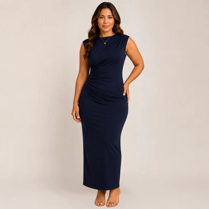 Female model in a stylish bodycon dress on a plain background.