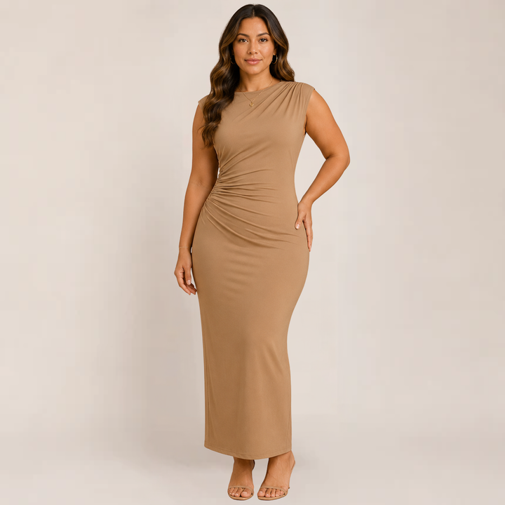 Female model wearing a bodycon evening outfit on a plain background.
