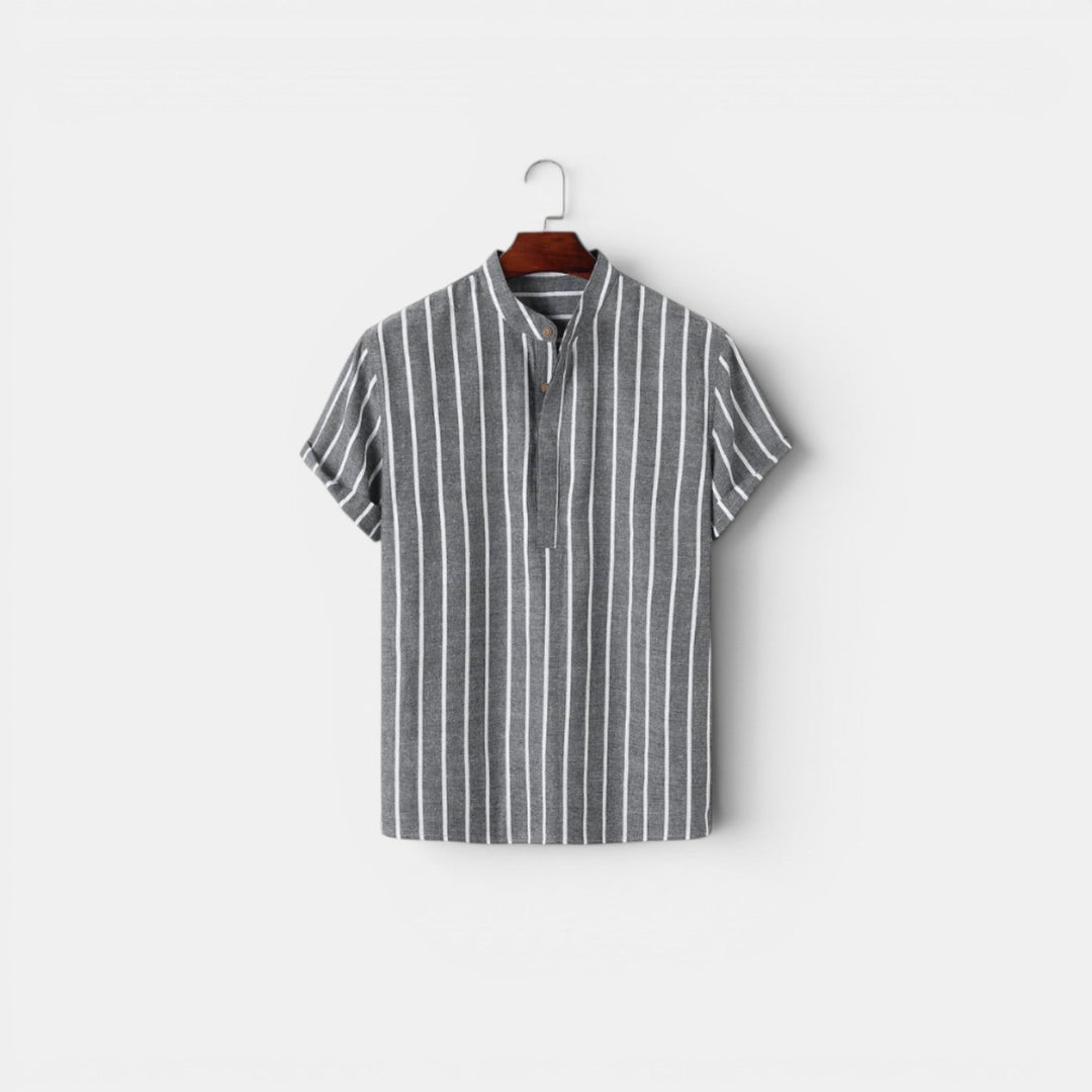 A breathable collared top with a plain background.