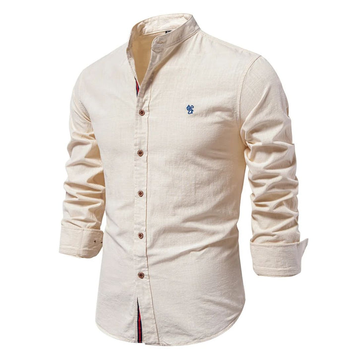A lightweight long sleeve shirt with a clean button-up design against a plain background.