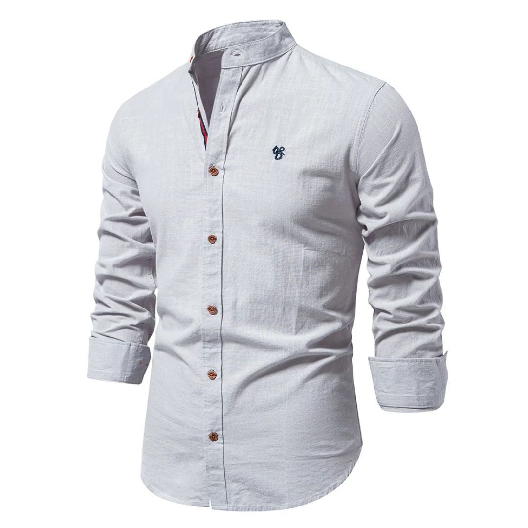 A casual button-front shirt with a modern collar on a plain background.