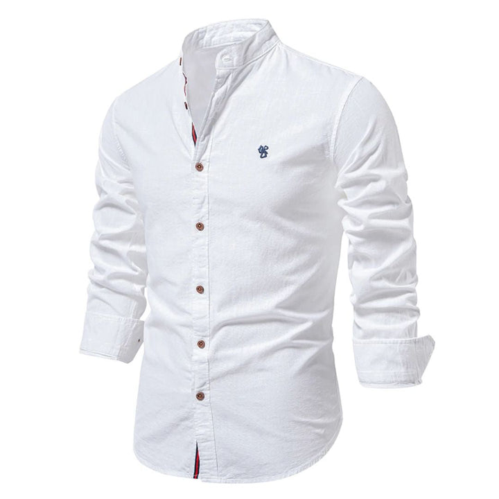 A solid-color stand collar shirt in a plain background setting.