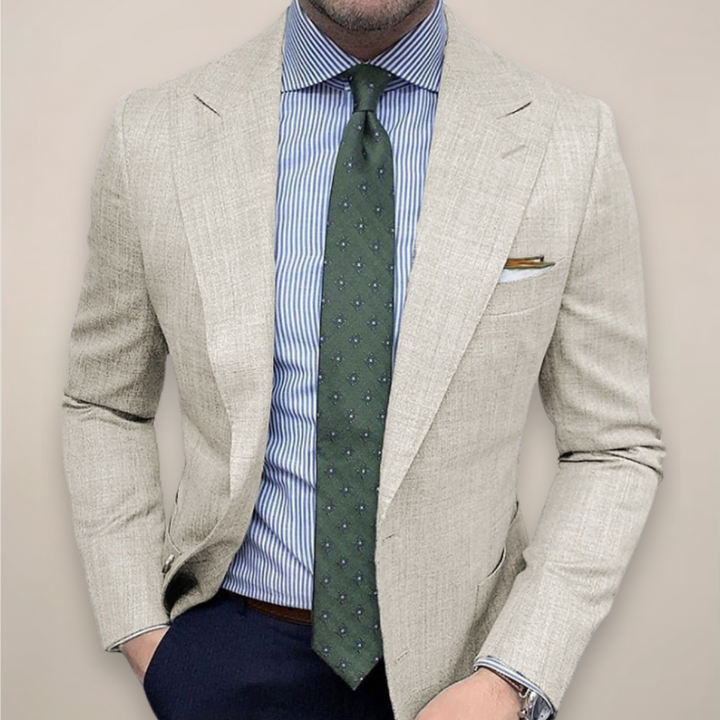  Male model in a smart-casual textured blazer jacket photographed on a plain background.