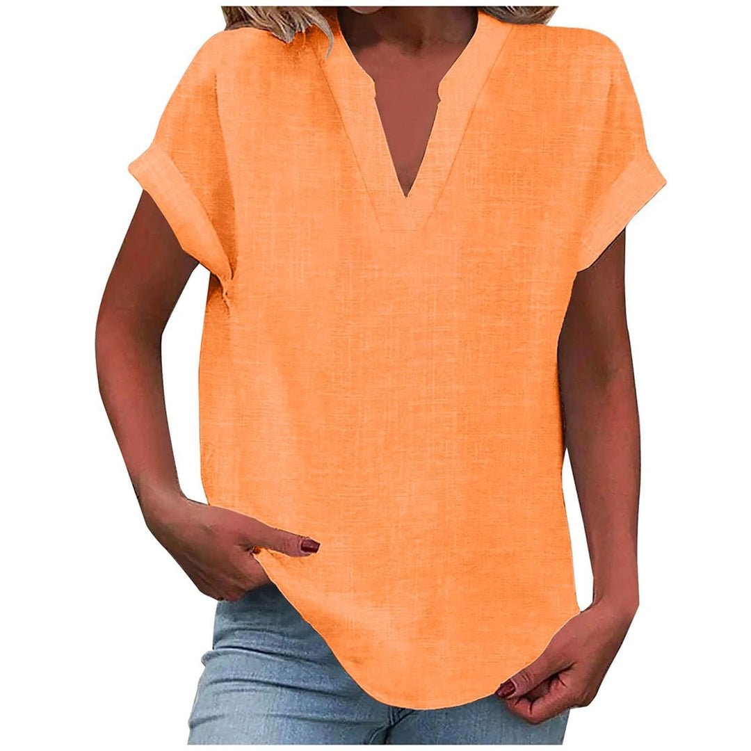 Feminine everyday blouse shown against a plain background with polished casual appeal.