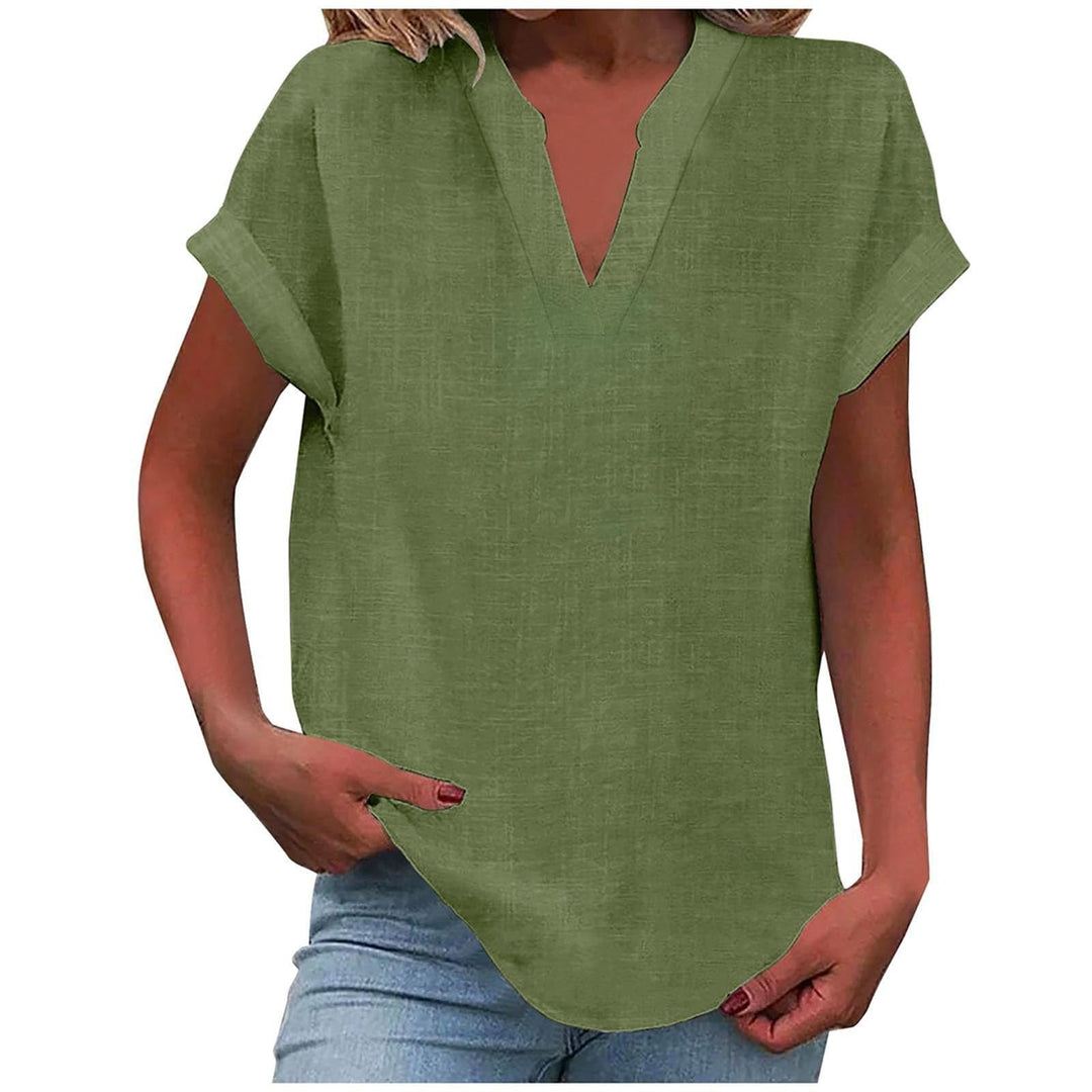 Comfortable V-neck blouse displayed against a plain background with polished feminine styling.