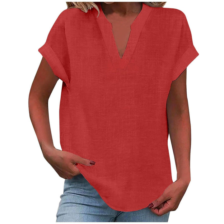 Relaxed-fit blouse displayed against a plain background for everyday elegant styling.