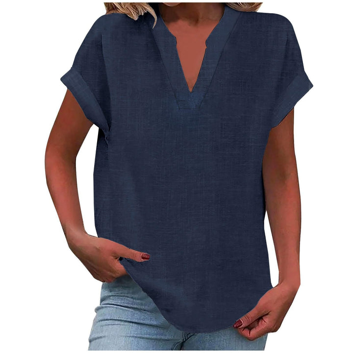 Timeless women’s blouse shown against a plain background with effortless elegant appeal.
