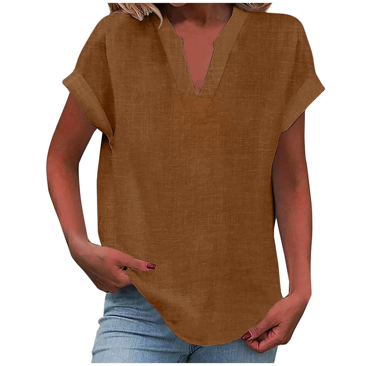 Everyday elegant blouse shown on a clean background with soft airy movement