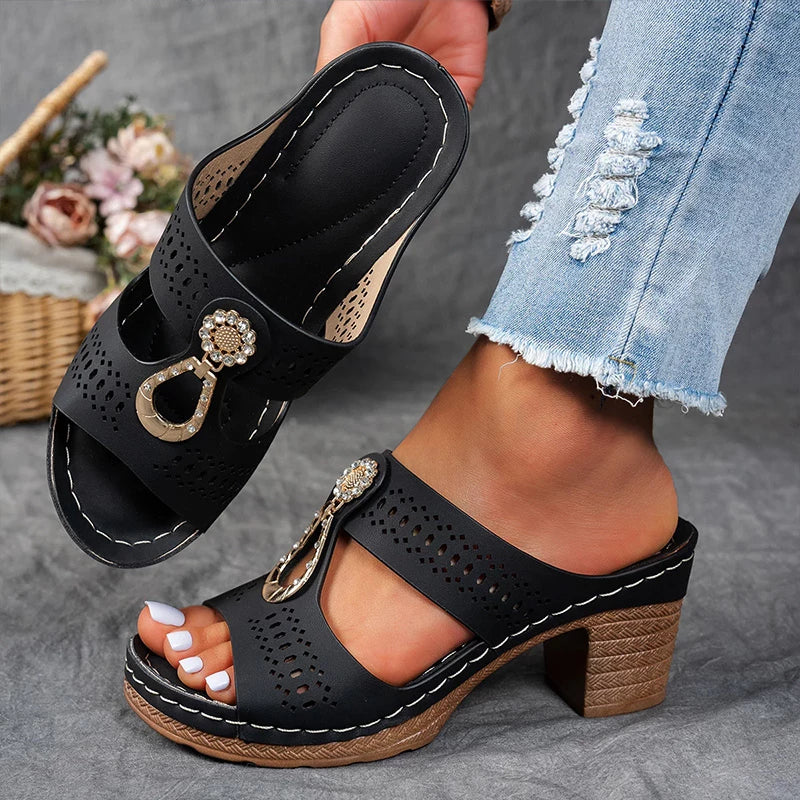 Stylish open sandal with supportive sole and subtle front detail.