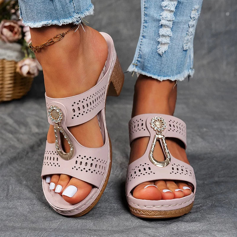 Open-style sandal with a 2-inch wedge shown on a plain background.