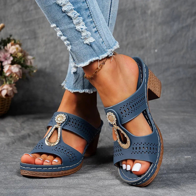 Comfortable slip-on sandal with supportive base and airy design.