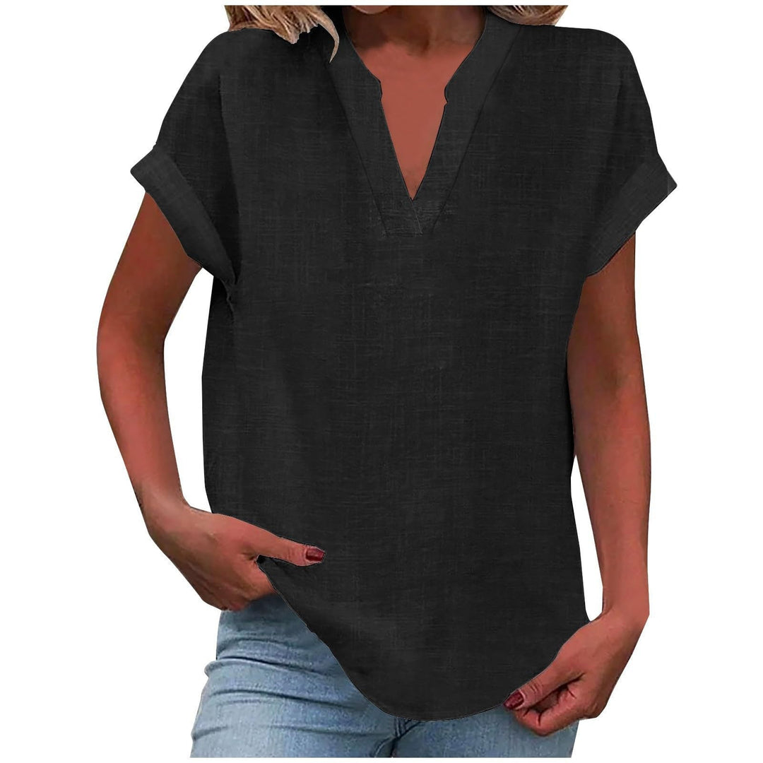 Soft V-neck blouse displayed on a clean background with relaxed breathable fabric.
