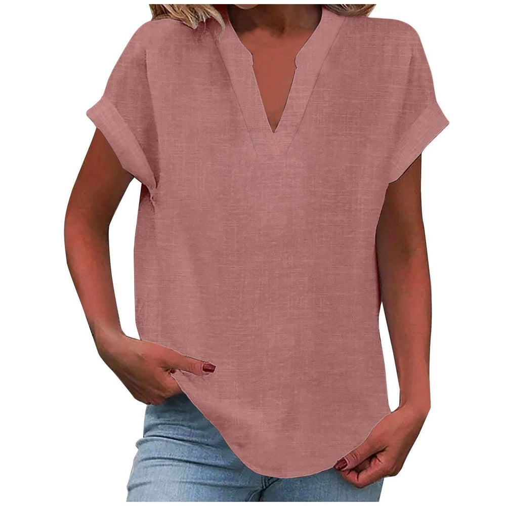 Lightweight women’s blouse shown on a plain background with soft draped styling.