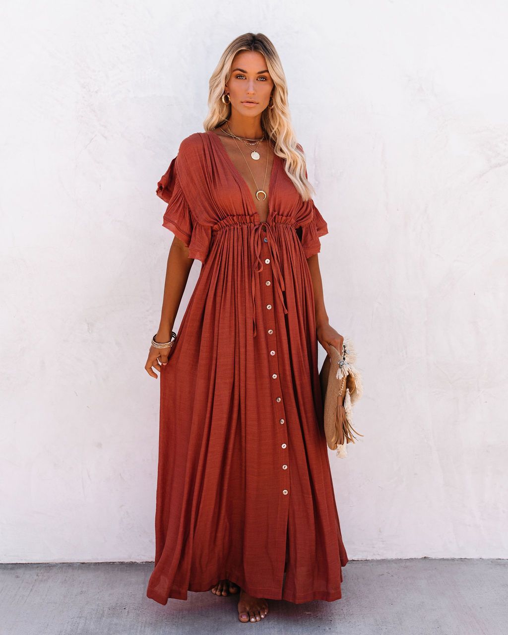 Bohemian-inspired women’s cover-up dress with flowing sleeves and airy fit.