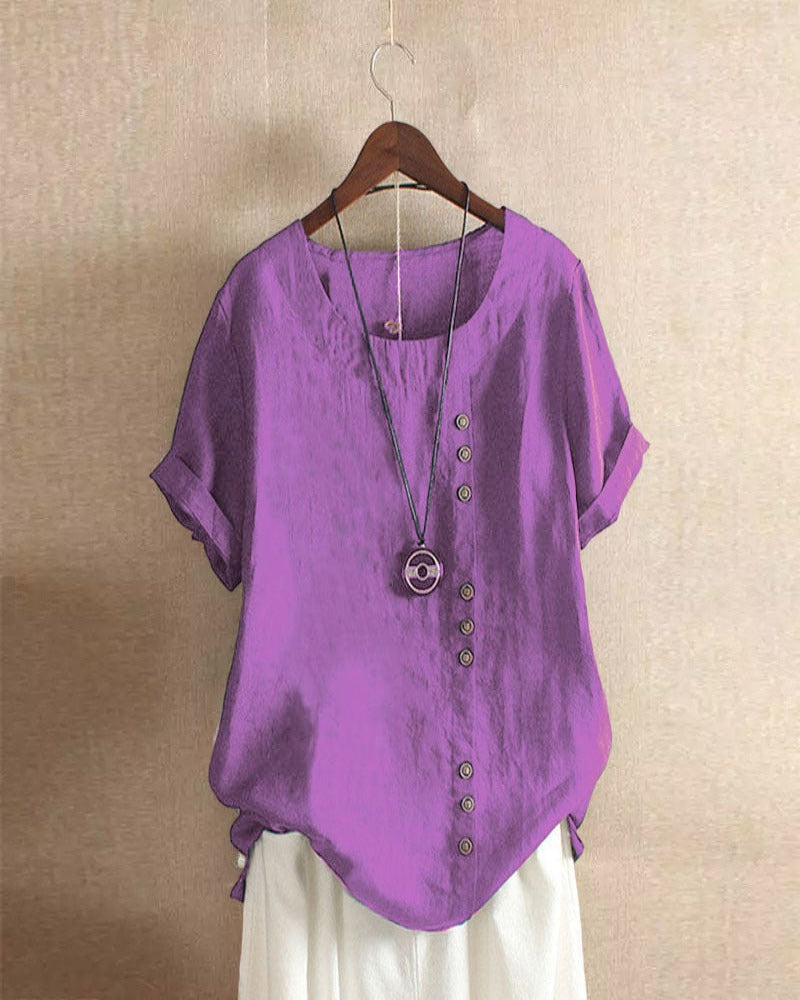 Long sleeve linen top shown on plain studio background.