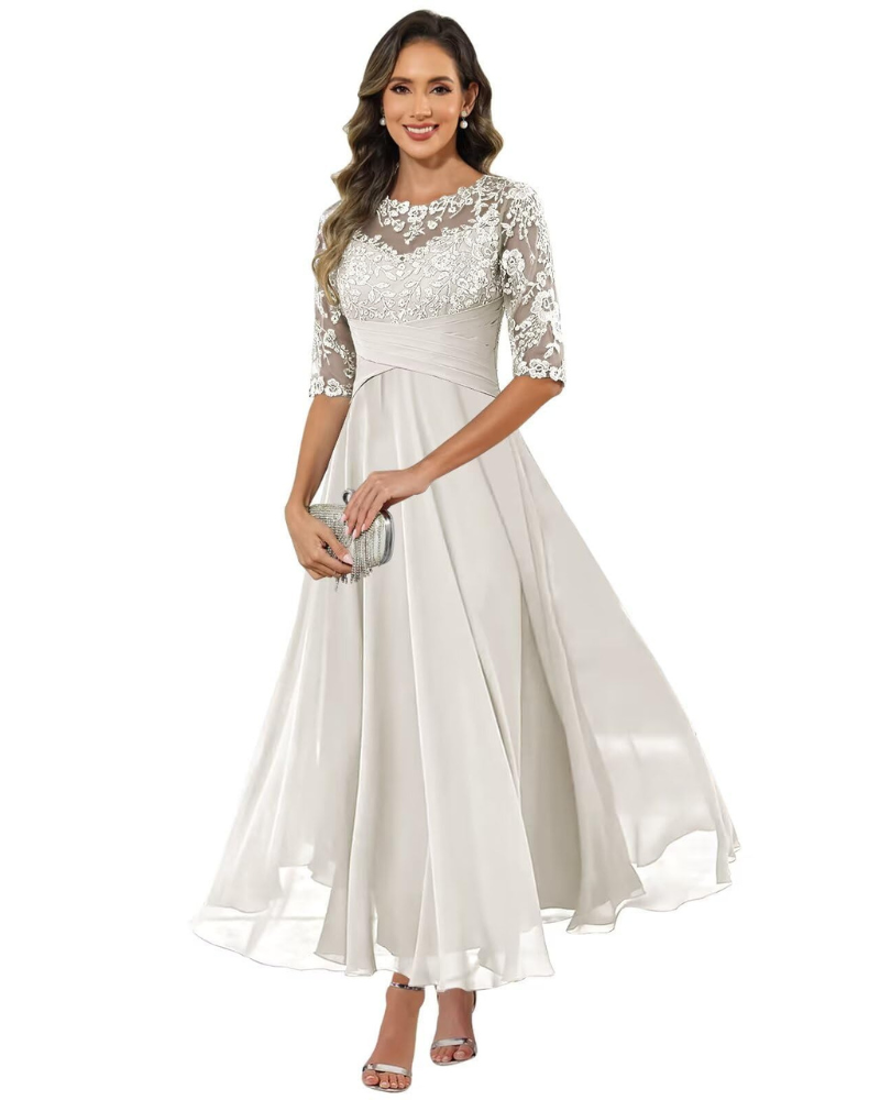 Female model in a refined evening dress with easy movement.