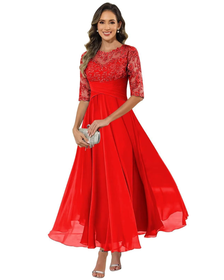 Female model in a flowing long dress for special occasions.