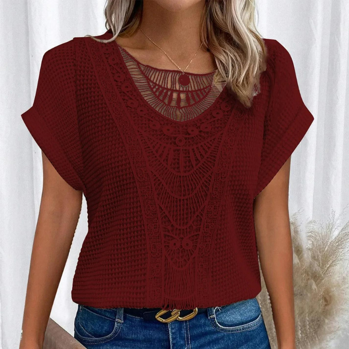 Woman model looking forward highlighting the blouse profile plain background neutral tone