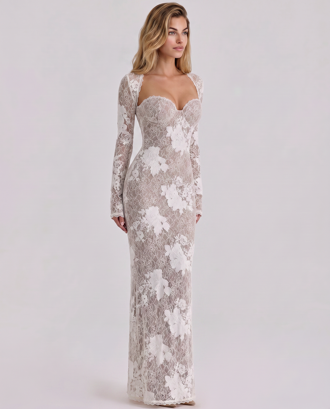 Woman wearing a long lace dress with sheer sleeves 