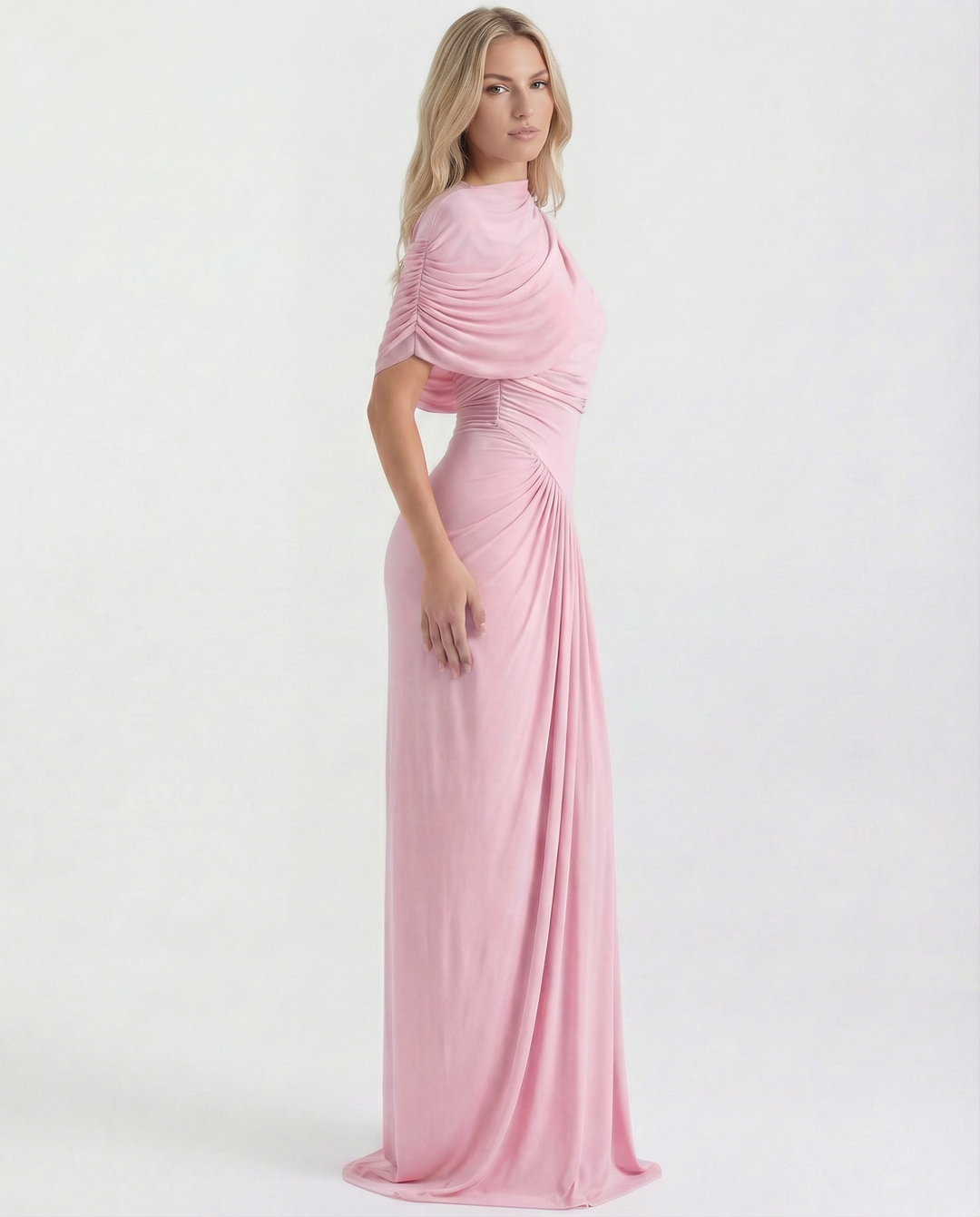 Woman in a long column dress with soft pleating and short sleeves  