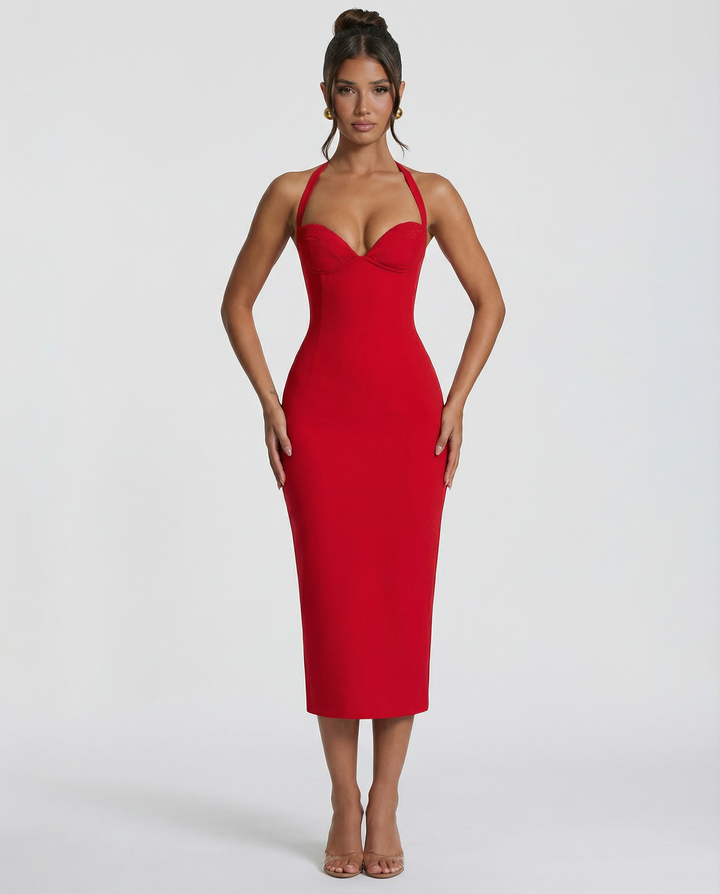 Female model wearing a off-shoulder outfit with a sleek silhouette.