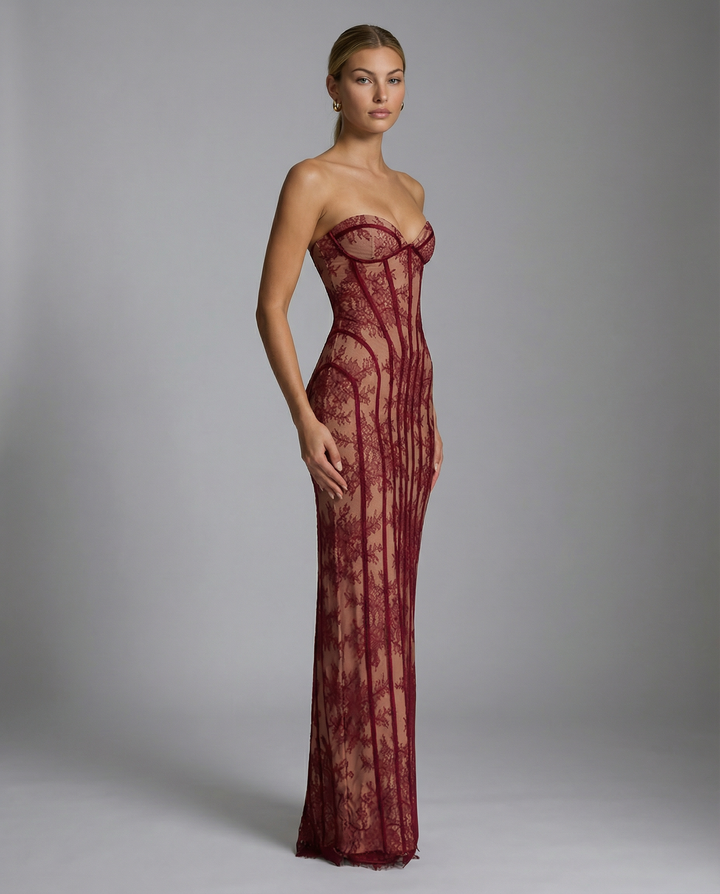 Female model showcasing a sweetheart neckline maxi dress on a plain background.