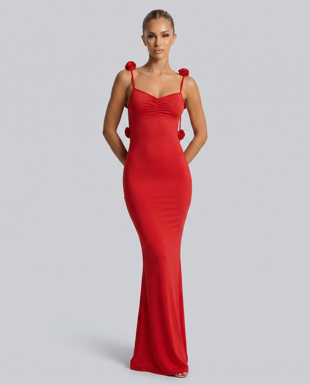 Model wearing a evening maxi dress with a clean silhouette.