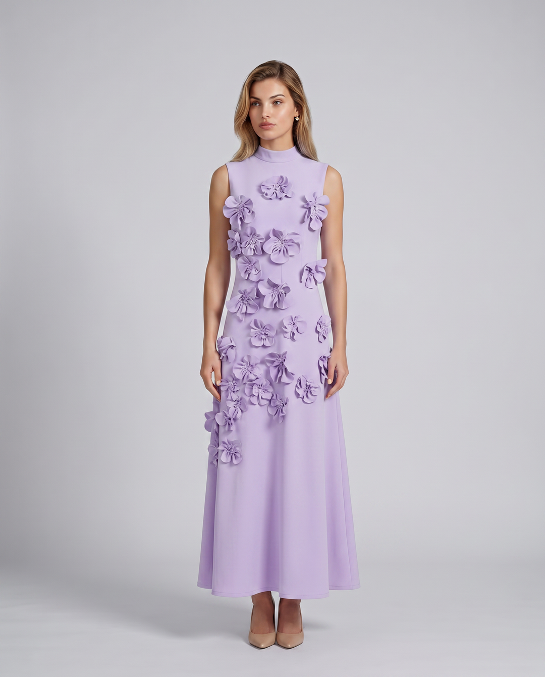 Female model in a high neckline maxi dress with raised floral accents.