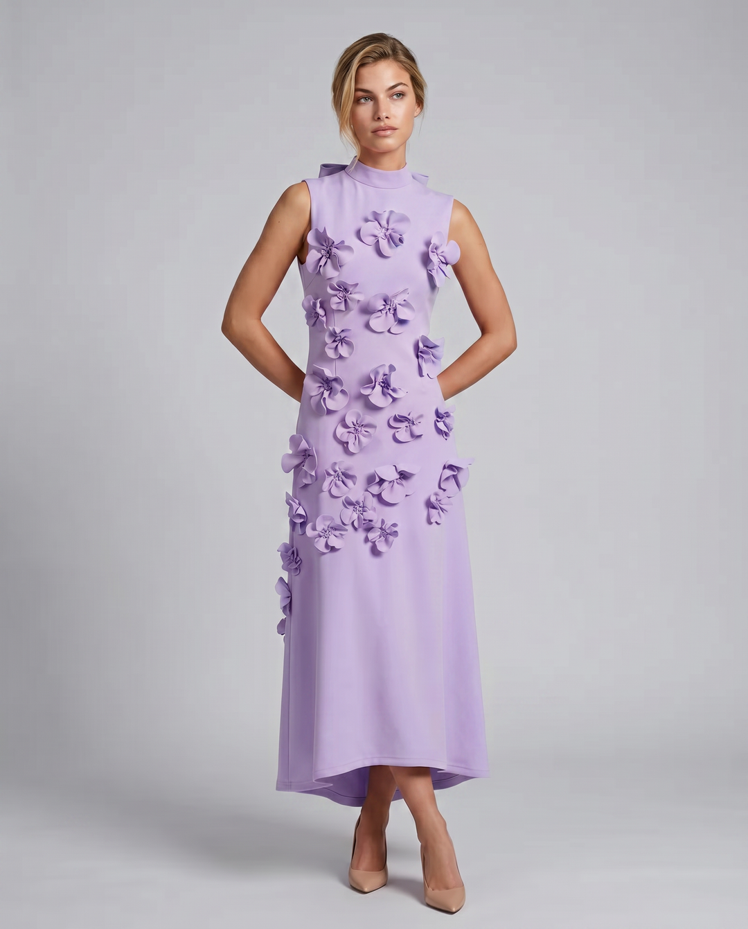 Woman styled in a floral textured long dress with a clean neckline.