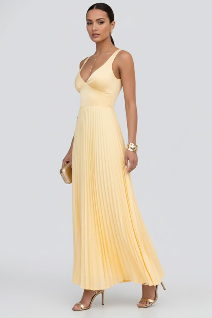 Light yellow flowing gown with deep neckline front