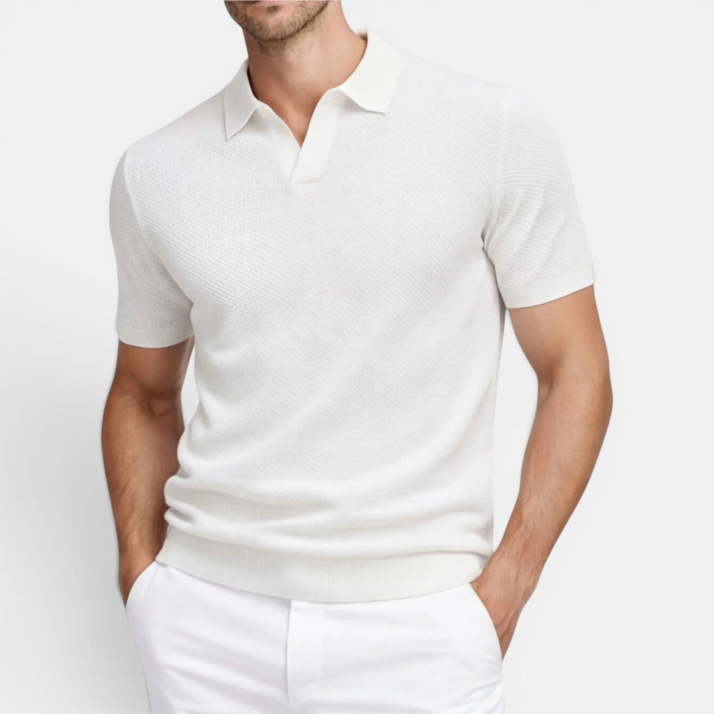  Model in a textured knit polo shirt shown on a plain background for summer styling.