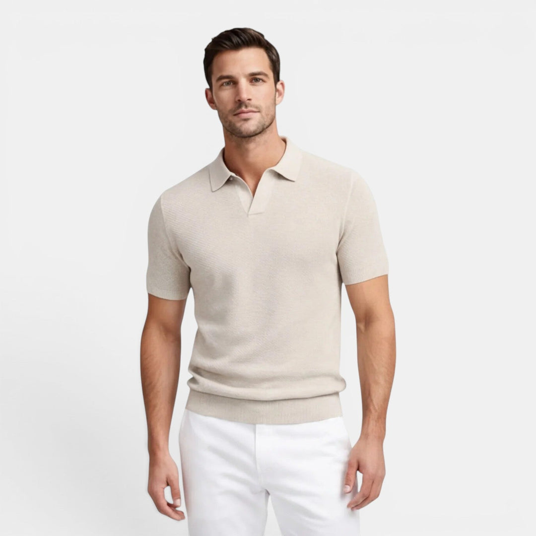 Model wearing a knit collared shirt with a clean warm-weather outfit style.