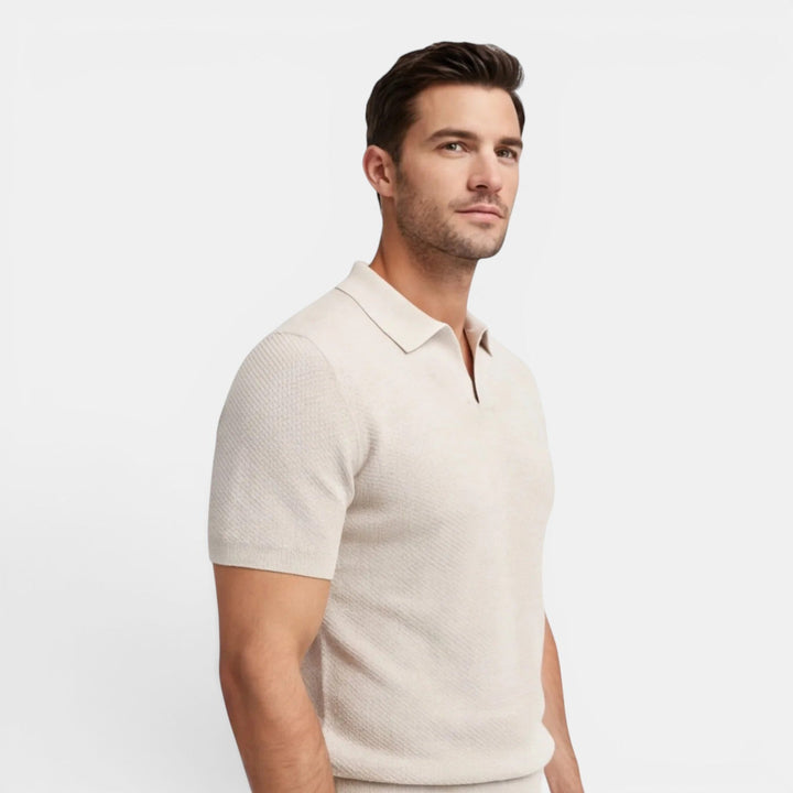 
Model wearing a lightweight knit polo shirt