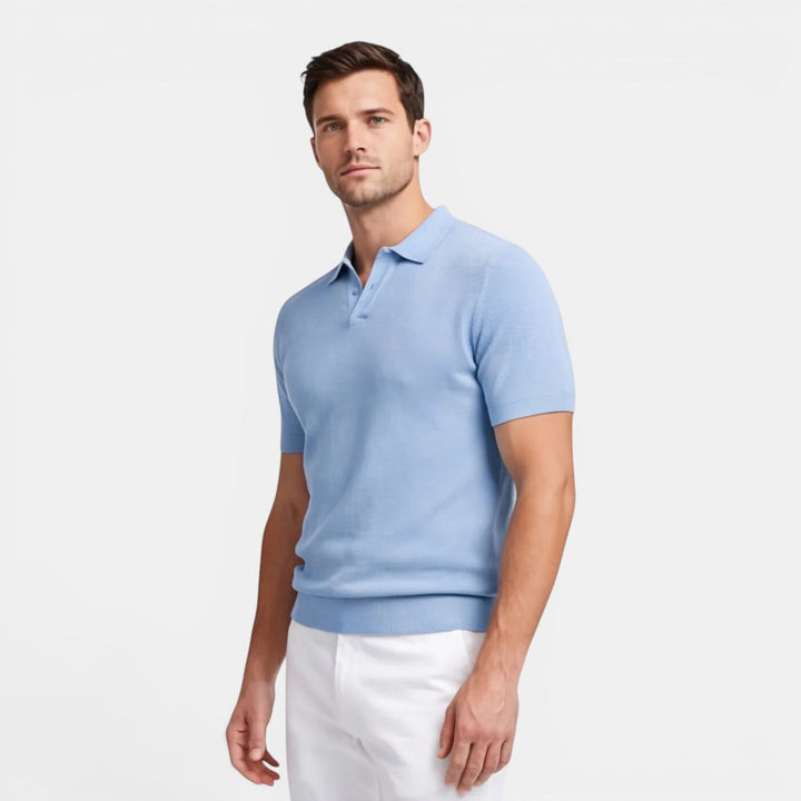  Model in a breathable knit polo shirt displayed against a plain background.