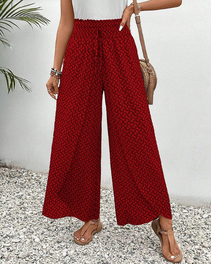 Wide-leg daily wear trousers shown with a clean plain background.