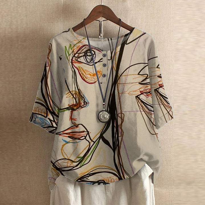 Timeless feminine blouse presented unworn against a clean background with graceful shaping.