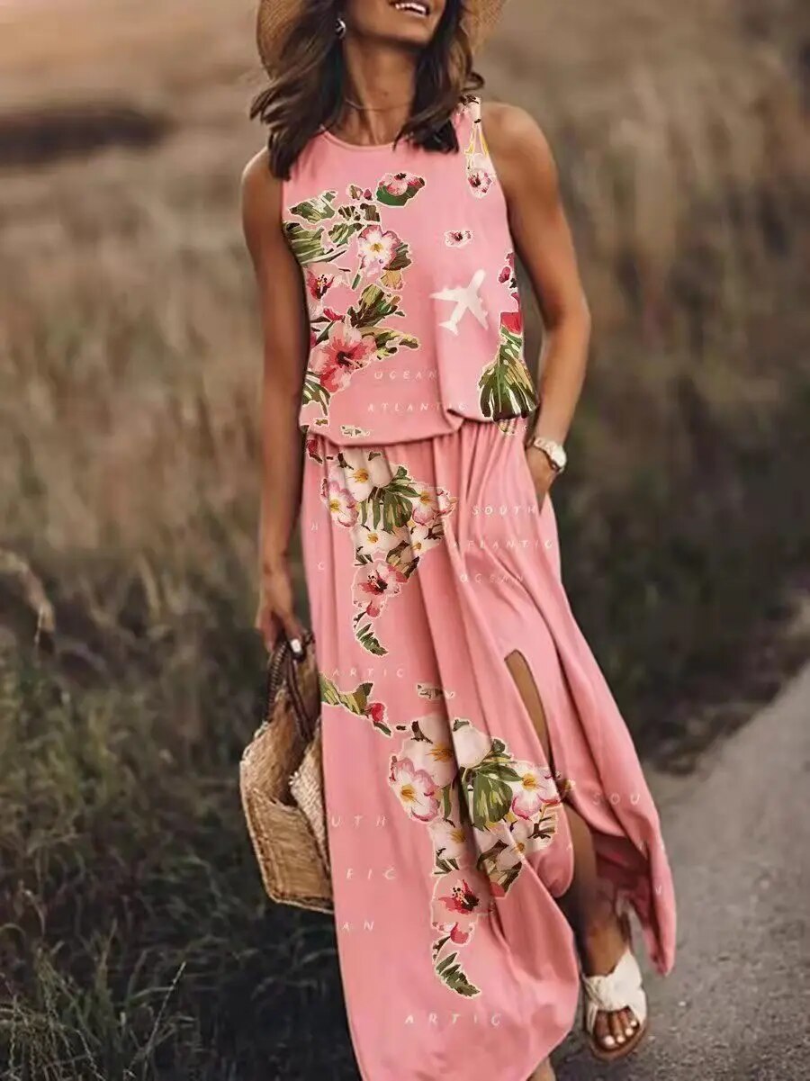 Female model wearing a sleeveless maxi dress with flowing skirt against a plain background.