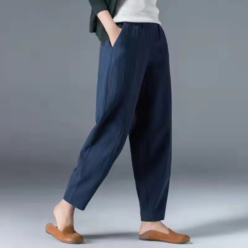 Soft breathable summer trousers for women shown without a model on a plain background.