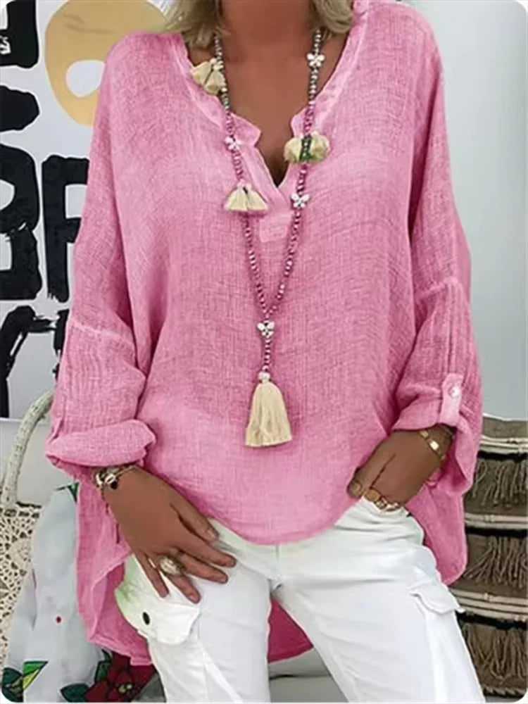 Lightweight draped blouse featuring a model on a clean background highlighting airy comfort.