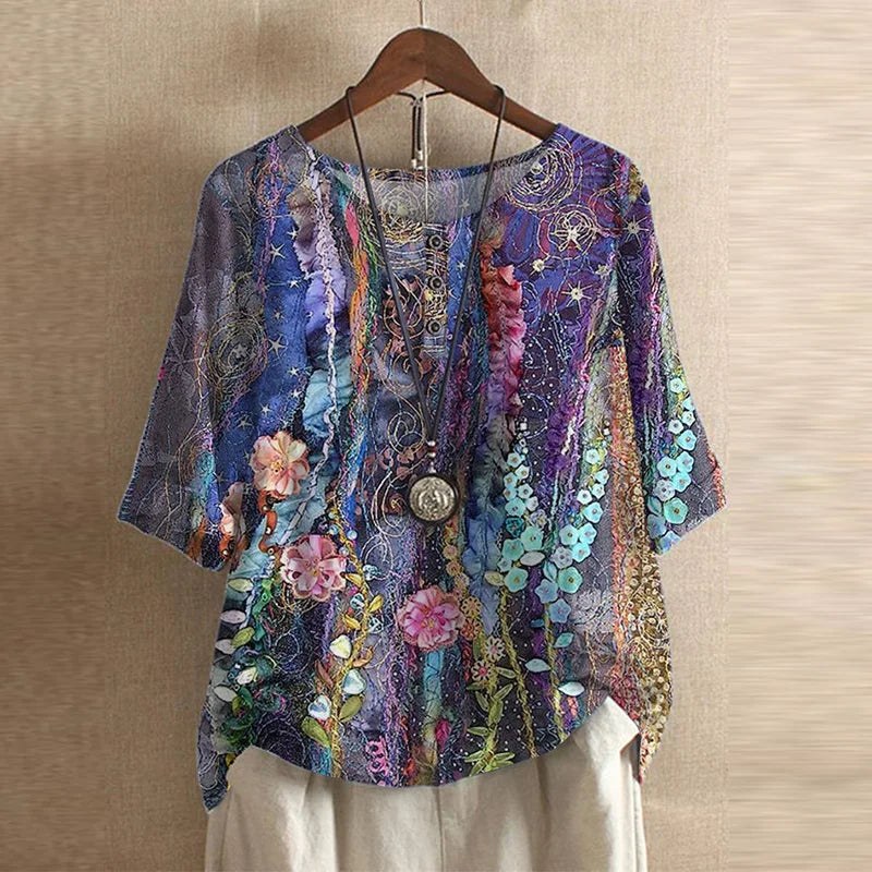 Soft classic blouse shown unworn on a clean background with subtle gathers and refined detail.
