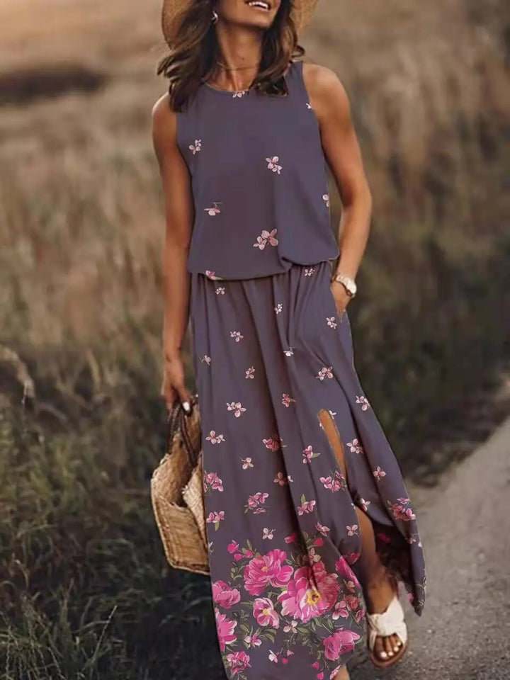 Sleeveless full-length dress displayed on a female model with a plain backdrop.