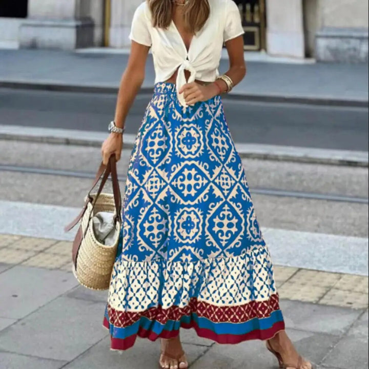 Breezy boho skirt with geometric pattern and elastic waist on a plain background.