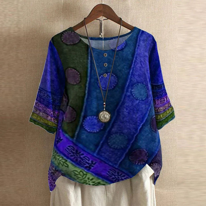 Soft breathable women’s blouse shown unworn on a clean background with refined feminine details.