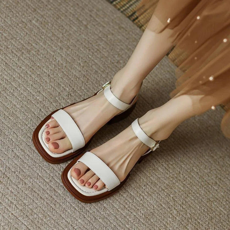 Close-up of a women’s sandal with a padded insole on a clean background.