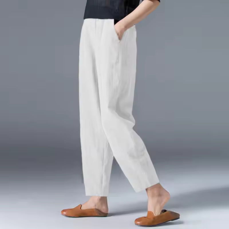 Stylish women’s wide leg trousers displayed on a clean plain background.