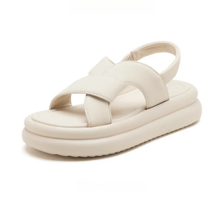 Lightweight wedge sandals for women displayed with cushioned straps and sturdy sole.