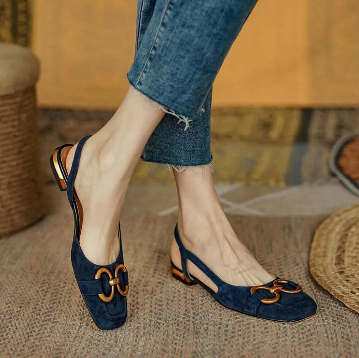 Women’s comfort sandal shown on foot against a plain background.