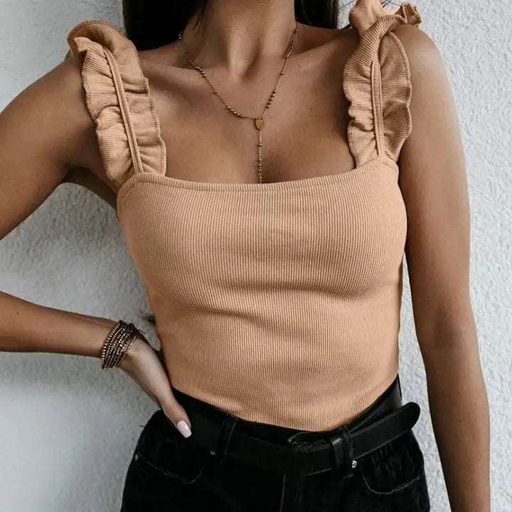 Relaxed-fit ruffled top with a soft flowy silhouette displayed on a plain background.